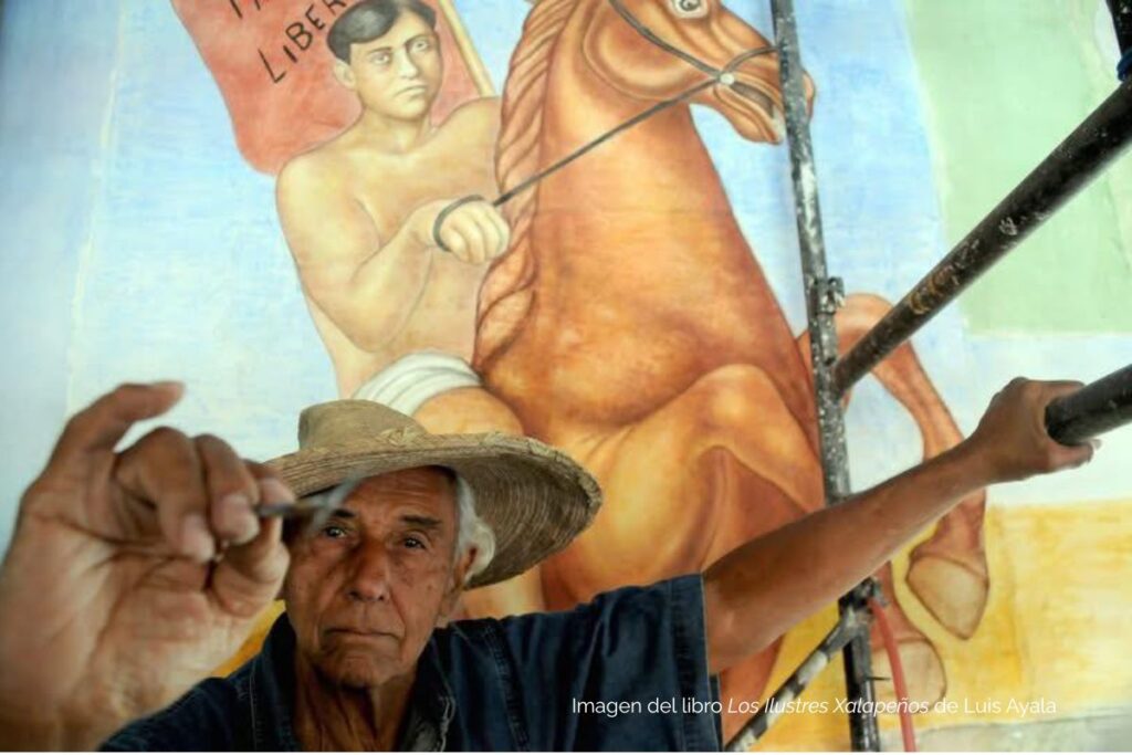 Melchor Peredo muralista mexicano trabajando en mural en Veracruz